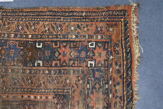 A Shiraz rug, a Bokhara saddlecloth and another rug (wear)